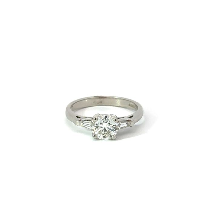 Platinum Round Brilliant Cut & Baguette Cut Diamond Three Stone Ring